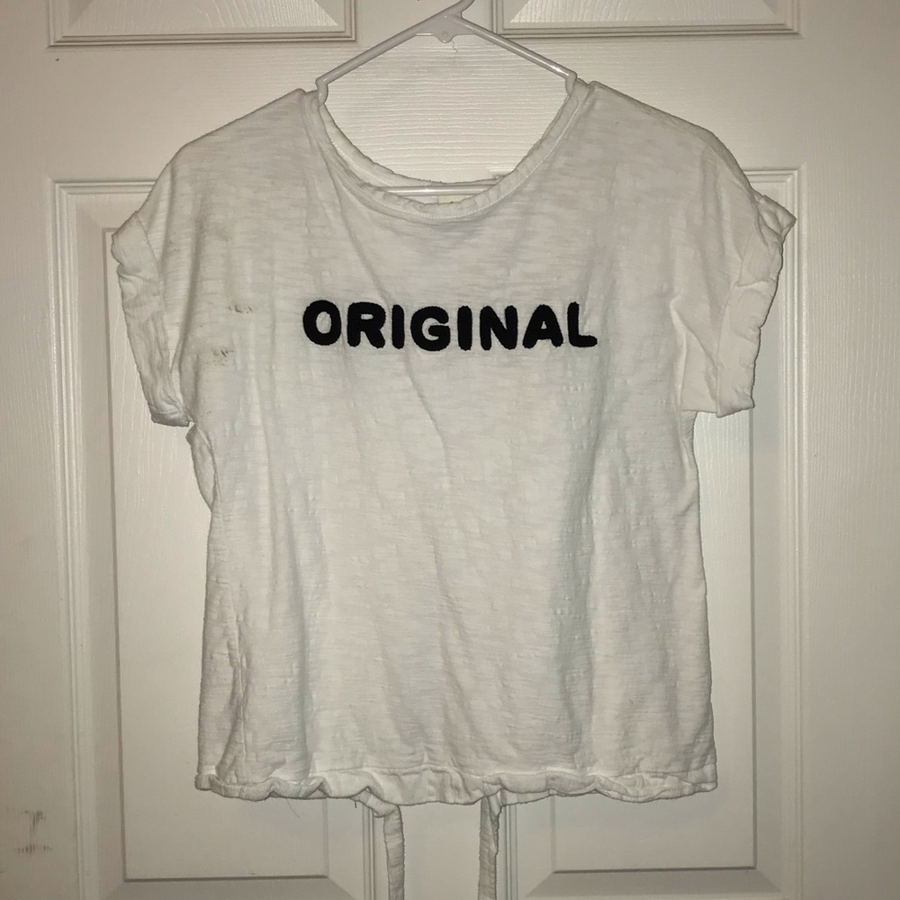 white tee with a tie in the back